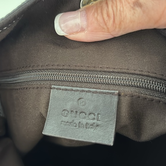 Gucci canvas, leather trim strap.  Very good condition. Almost like brand new - Picture 4 of 6